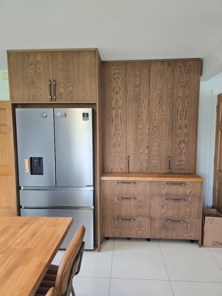 Handmade oak-veneered furniture with dark Jacobean finish in Trim: completed unit front view